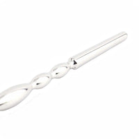 Experience unprecedented urethral pleasure with our wide, smooth, insertable rod. This chastity kit penis plug enhances your sounding cock adventures, featuring a loop handle like a string for safe and easy control. Perfect for both beginners and enthusiasts.