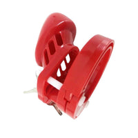 Experience ultimate control with our Red Cock cage device. Featuring five adjustable rings of various sizes, including XXL for the largest fit, it comfortably encases the penis and testicles, ensuring secure and customizable wear.
