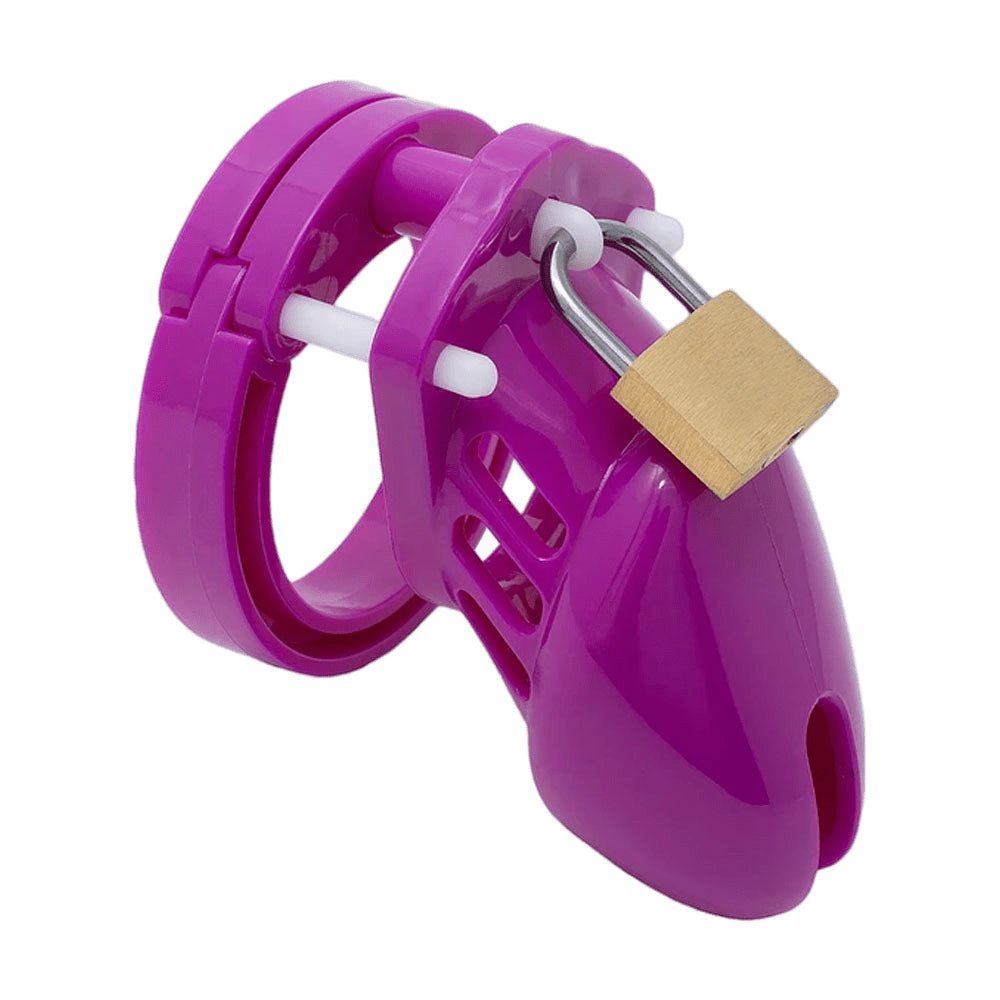 Sissy penis cage in vibrant magenta caters to uncut, uncircumcised users. Foreskin and PA friendly with ribbed, adjustable design for comfort. Perfect for discreet, long-term wear.