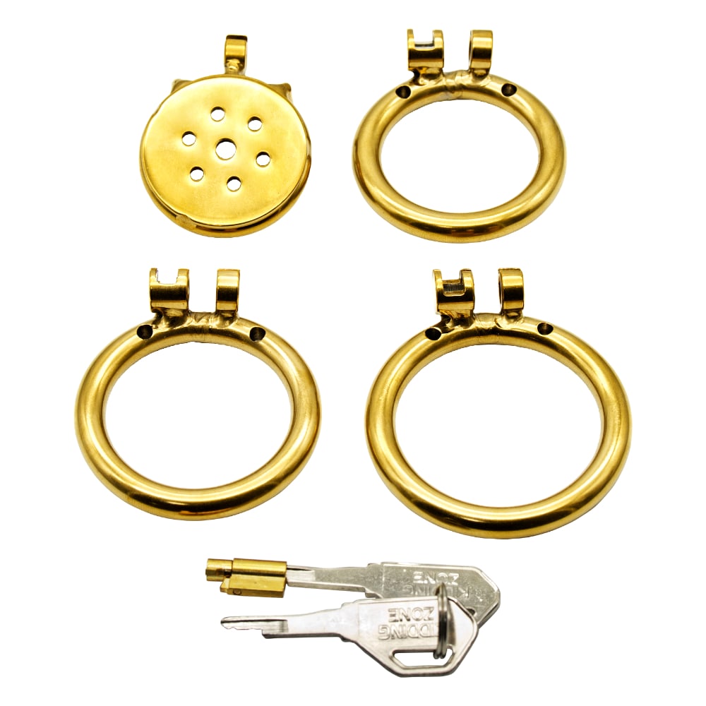 Experience ultimate control with the Golden Flat Gatling Cock cage a sleek metal device that flattens your cock, perfect for sissy play. Inspired by a rattlesnake's design, it features an optional dilator for enhanced sensation, ensuring no chance of escape.