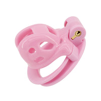 Embrace your submissive fantasies with this pink cock cage, offering secure comfort and style. Perfect under an athletic thong or bikini, its breathable design allows for long-term wear. Find your perfect fit today.