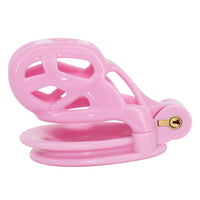The athletic pink leather cage combines elegance and sportiness, featuring functional nubs for a unique sensation. Ideal for those desiring a playful twist beneath their shirts.