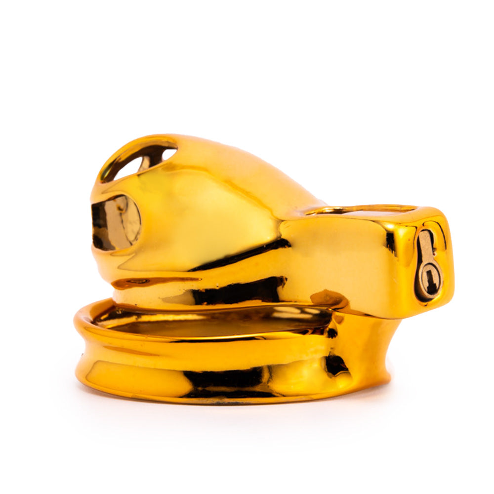 Indulge in luxurious control with this custom rigid cock cage. Its elegant gold finish, breathable design, and secure lock offer a stylish alternative to typical devices, enhancing your intimate experiences.