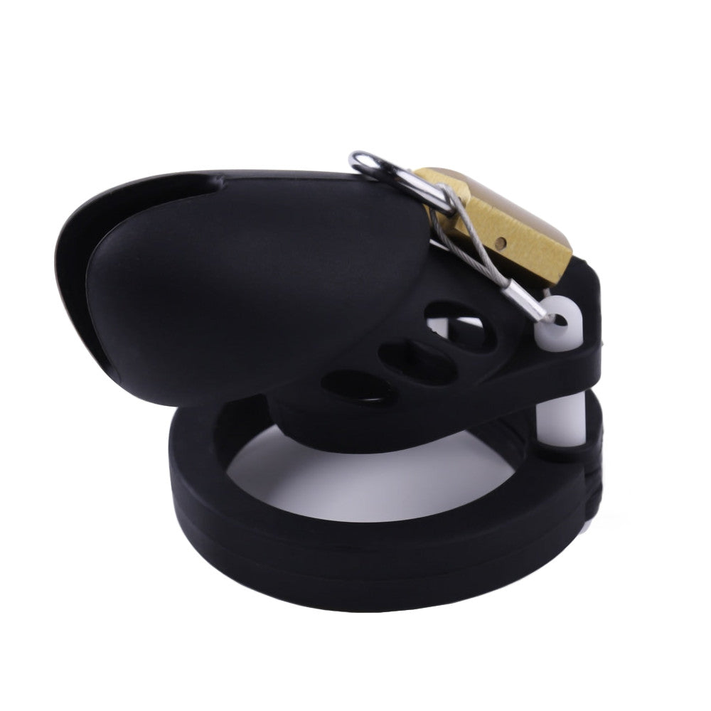 Embrace submission with our lightweight, hypoallergenic silicone cage, perfect for exploring male chastity. Strong yet discreet, it locks your cock, shifting macho energy into a balanced, masculine surrender. Available in varied colors like playful pink, this cage serves both dominant and submissive dynamics, reinforcing relational control and enhancing intimacy without discomfort.