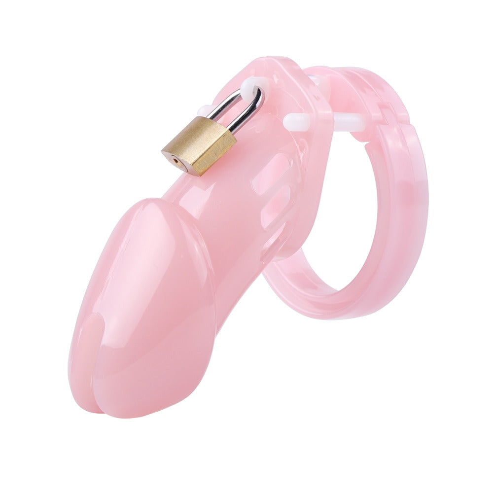 Embrace your inner king while remaining caged with our pink silicone chastity device. Tame the lion's roar and quell the cougar's rage of uncontrolled desires. Experience comfort and control as you indulge in feminine elegance.