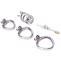 Merciless Chastity Enforcer: a metal cock cage for the daring sounding male. On your knees, shaved and brushed clean, your control is stripped away. Don't let desires rot; embrace merciless chastity.