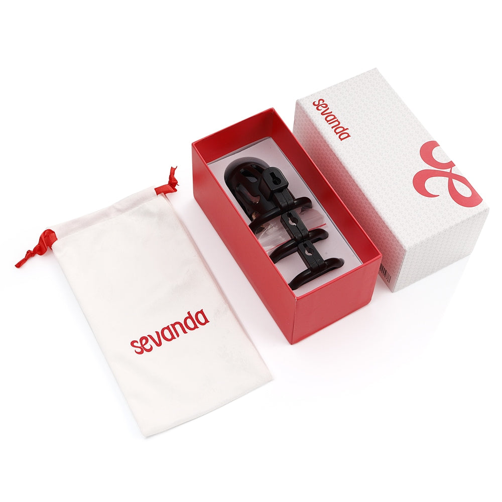 Discover the ultimate guide to Chastity. Our black cage acts like a vice, securing your locking penis comfortably. Lightweight resin wears invisibly. Top-locking design with silver key ensures perfect fit. Discreet mail delivery.