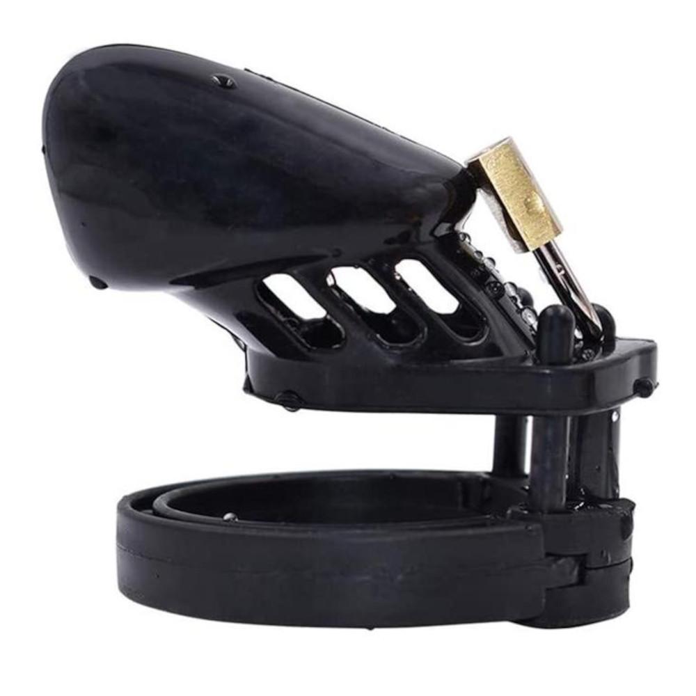 Experience ultimate control with the Midnight Black device. Designed to fit a number of sizes with its triple cock ring options, this cage accommodates girthy partners with a 1.33-inch diameter. Its ergonomic shape ensures comfort during extended wear, making it the perfect choice for those looking to explore new dimensions in dominance and submission.
