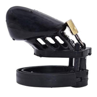 Experience ultimate control with the Midnight Black device. Designed to fit a number of sizes with its triple cock ring options, this cage accommodates girthy partners with a 1.33-inch diameter. Its ergonomic shape ensures comfort during extended wear, making it the perfect choice for those looking to explore new dimensions in dominance and submission.