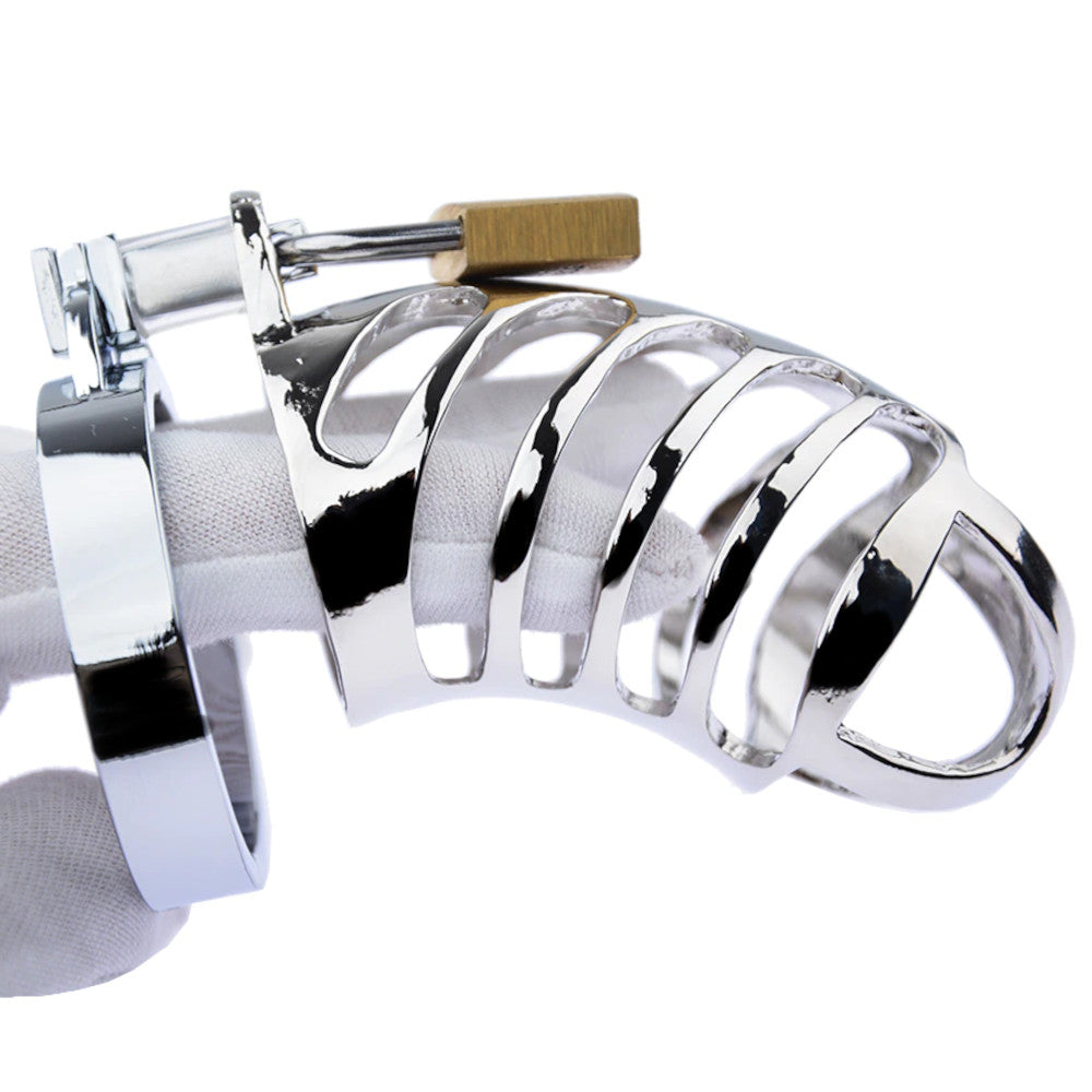 Unlock your chastity journey with the jewelry-like Coil of Despair cock cage. Its unique, unbreakable steel design ensures security and comfort. Versatile and stylish, it wears perfectly, marrying function and elegance.
