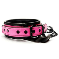 Elevate your intimate moments with this pink leather collar and leash set. The adjustable collar and matching leash are crafted from premium leather. Combine with cuffs or handcuffs to enhance your playtime.