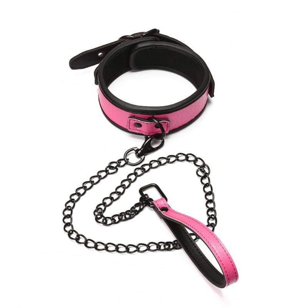 Unleash your inner allure with our studded pink leather collar featuring a honeycomb design inspired by the mythical basilisk. This captivating accessory adds a touch of enchantment and elegance to any ensemble.