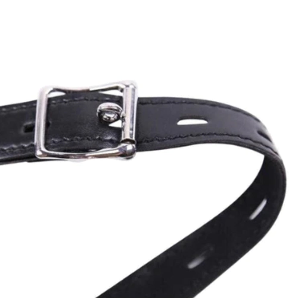 Discover ultimate restraint with our black leather belt for women. Its exposed design pokes at your desires, while adjustable straps ensure a comfortable fit from head to skin. Perfect for those pegged to explore new boundaries.