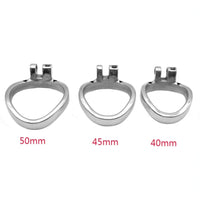 The versatile metal chastity accessory ensures unrivaled comfort and style. With sizes up to 2", this stainless steel ring securely fits the base, minimizing swelling for testicles. Its sleek color amplifies its appeal as a dick cage negative solution.